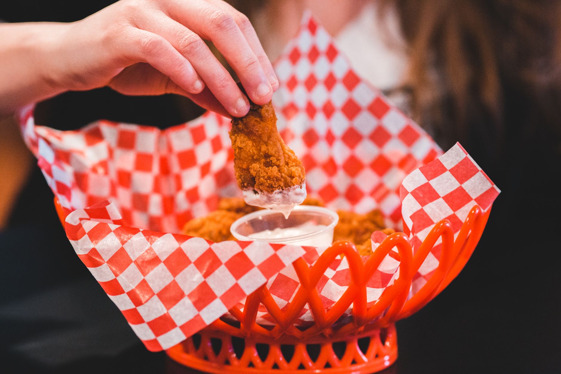 https://www.pexels.com/photo/person-eating-chicken-4061488/