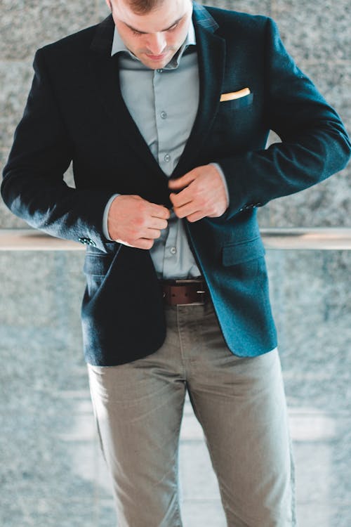 Man in Blue Blazer and Gray Pants