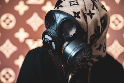 Free Person Wearing Black Gas Mask Stock Photo