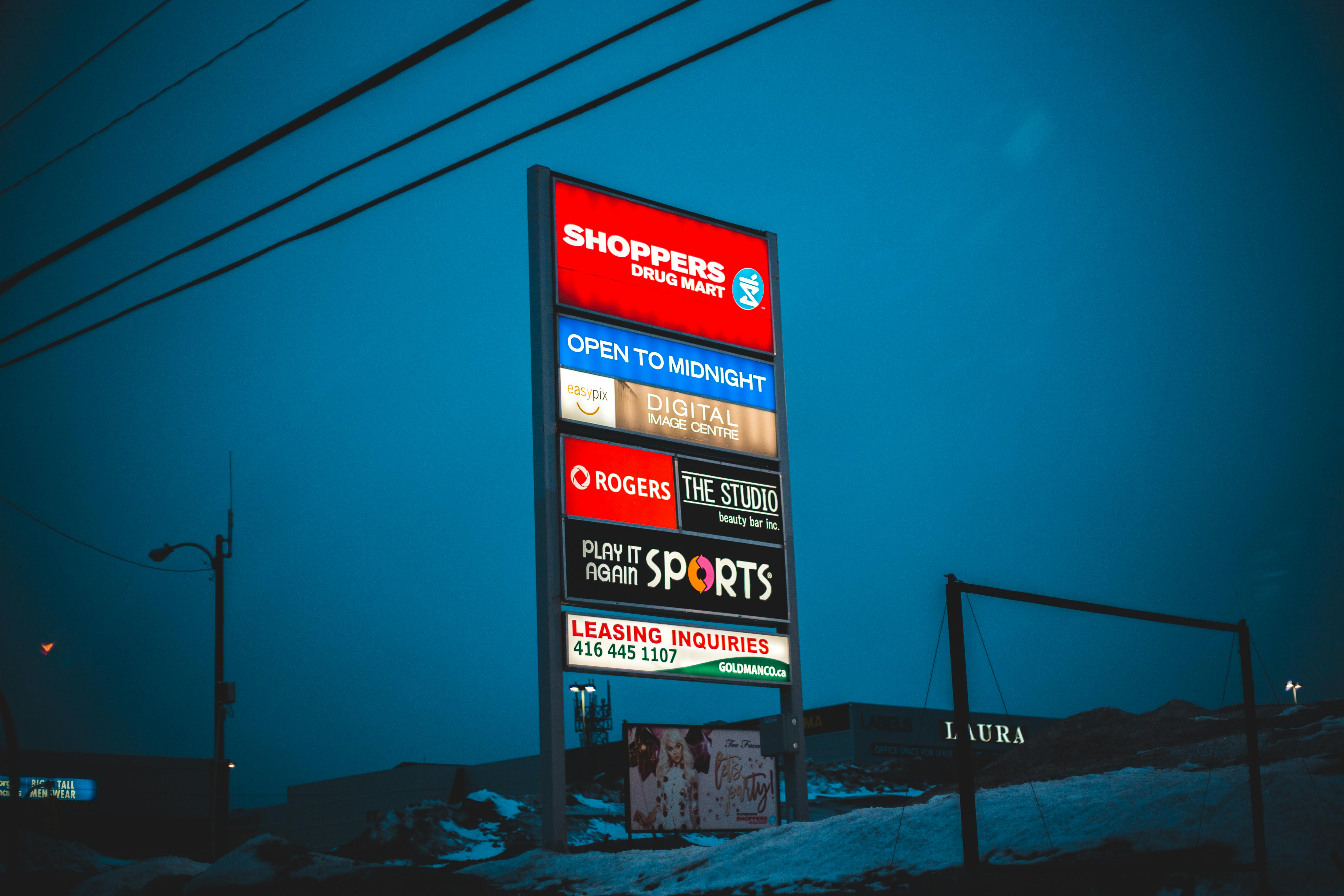 glowing signboard of shopping mall in winter