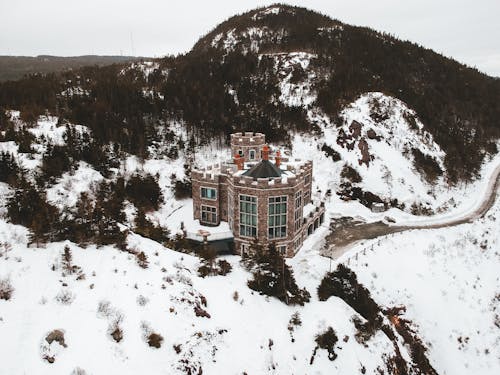 Lonely masonry castle in snowy valley