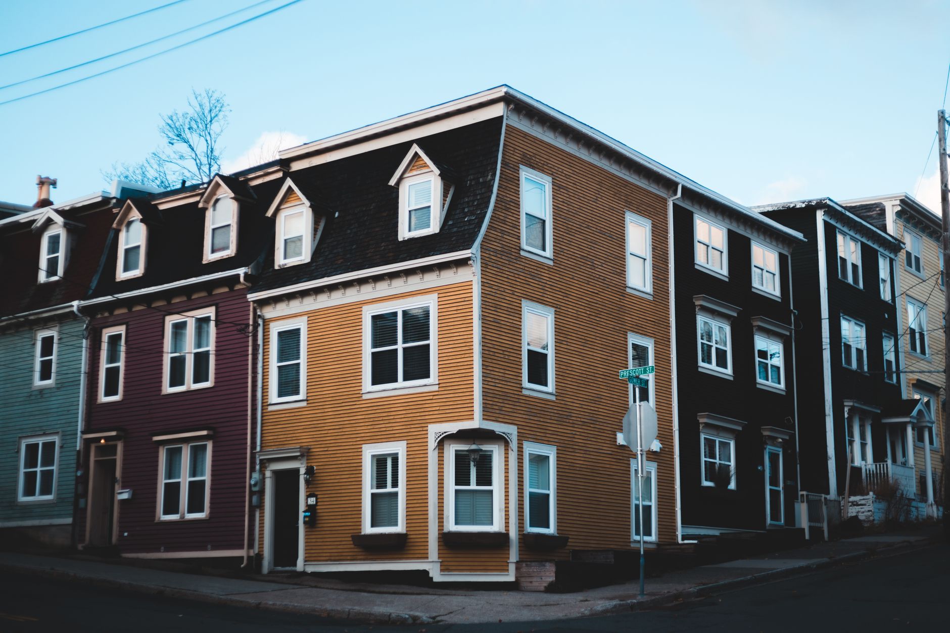 A row of houses along a residential street, illustrating how assessors value many properties at once