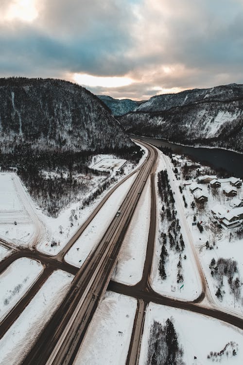 Snow Covered Road Near Mountain