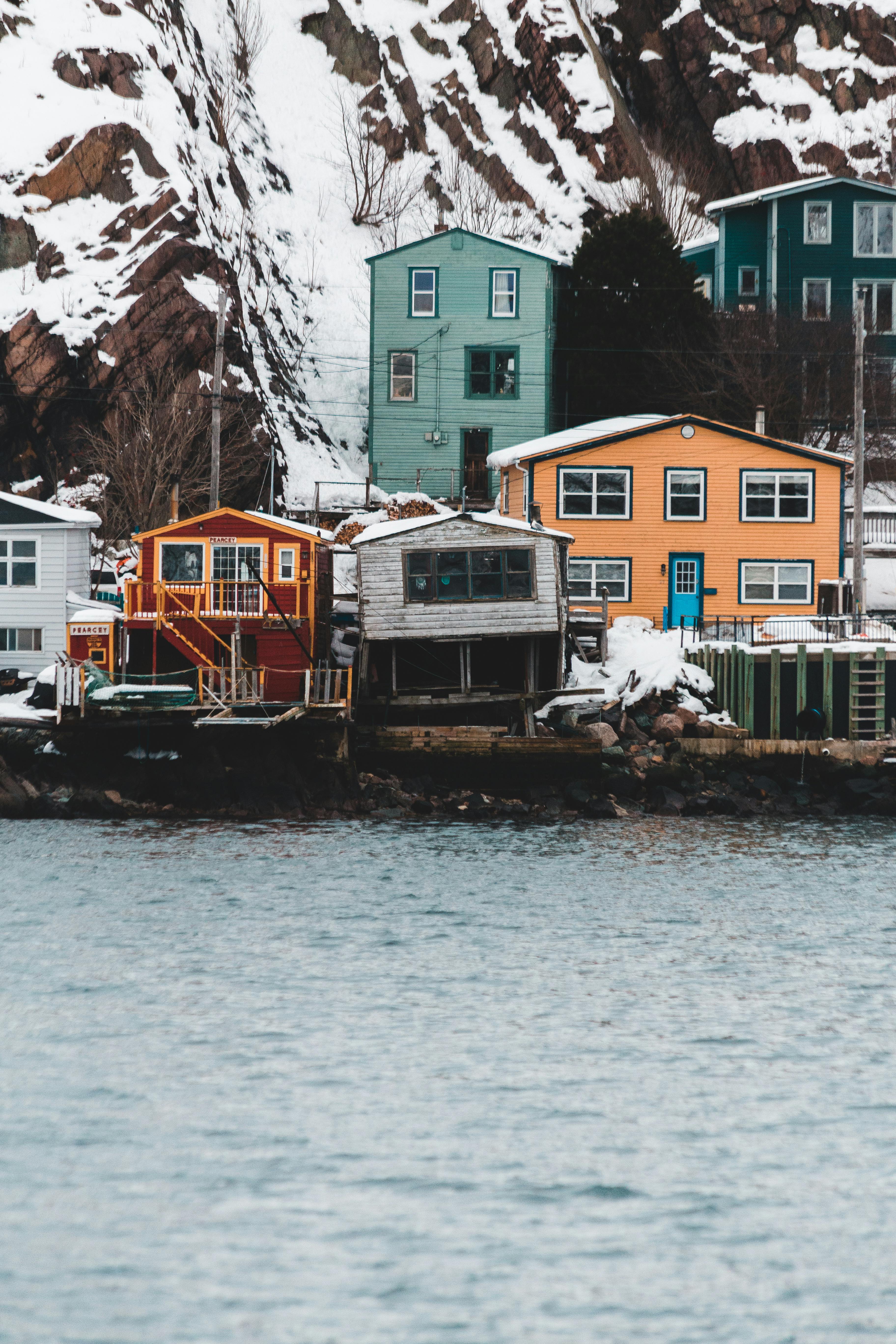 Houses Near Body of Water · Free Stock Photo : An astonishing picture depicting a stunning scenery. Its hues are just bold and combination perfectly. The arrangement looks great, and the particulars are also highly clear.