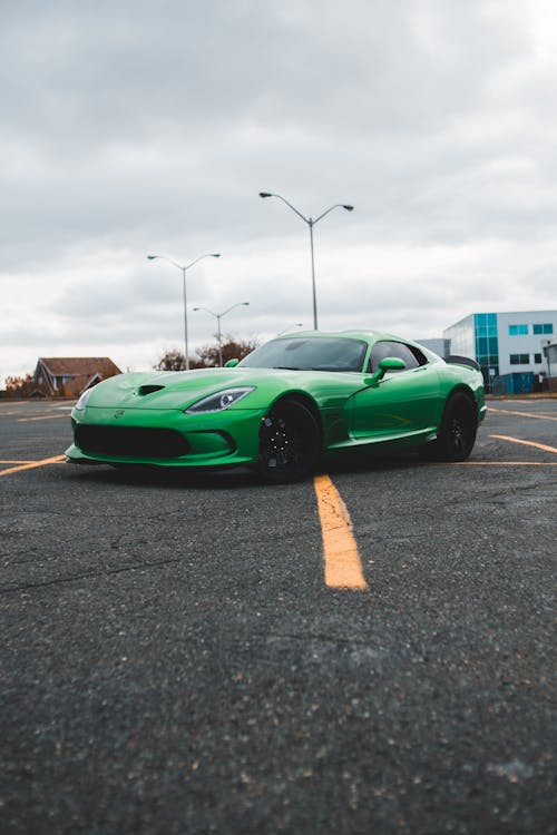 Green Porsche 911 on Road