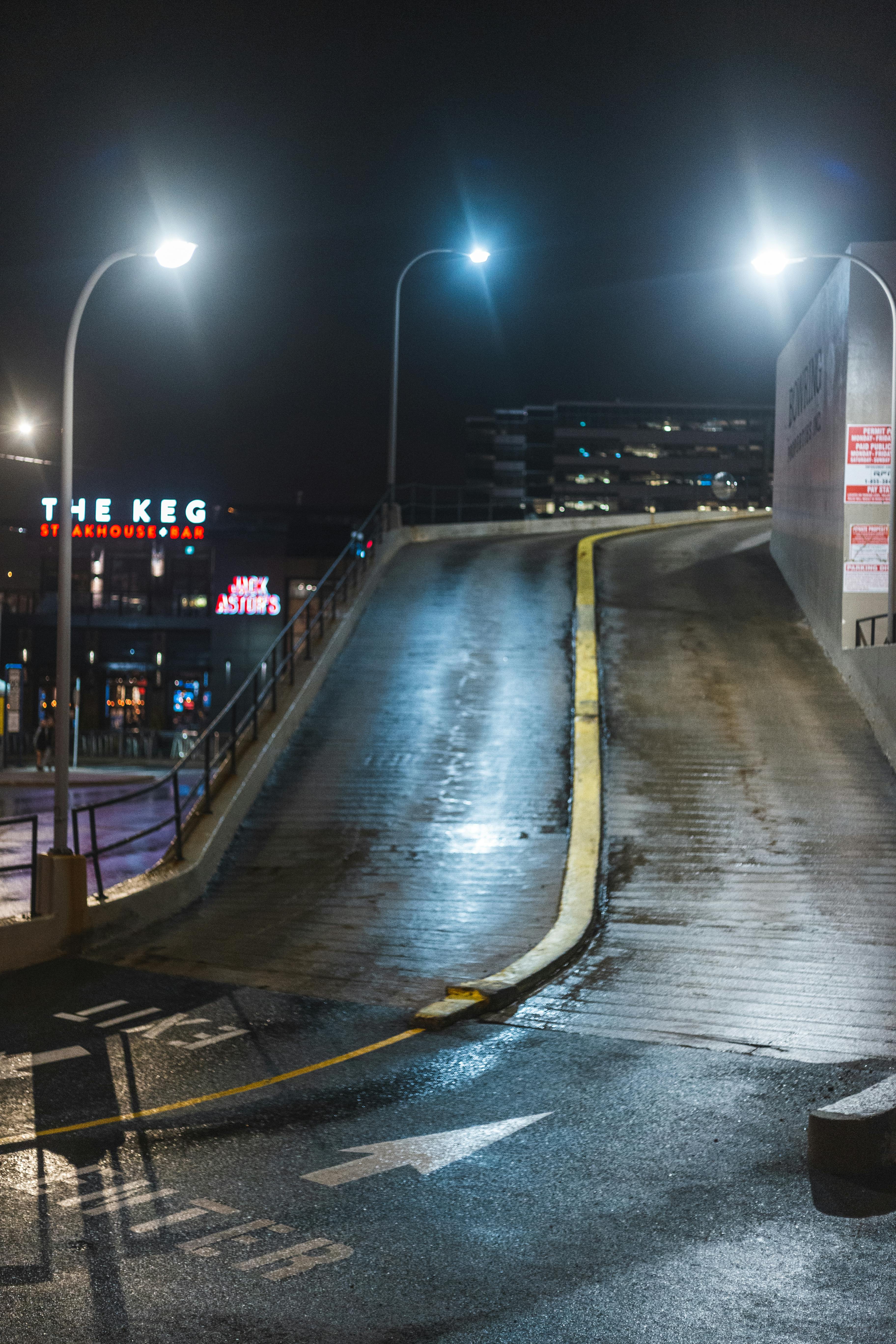Empty Road With Lights Turned on during Night Time · Free Stock Photo