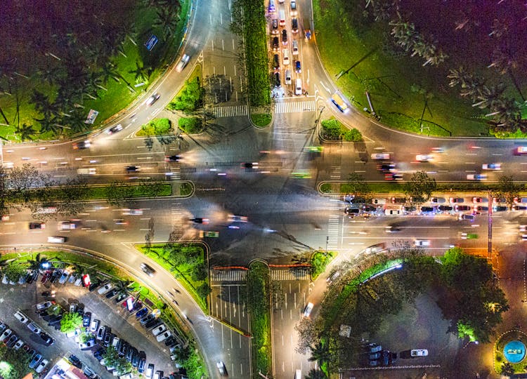 Aerial View Of Cars On Intersecting Roads