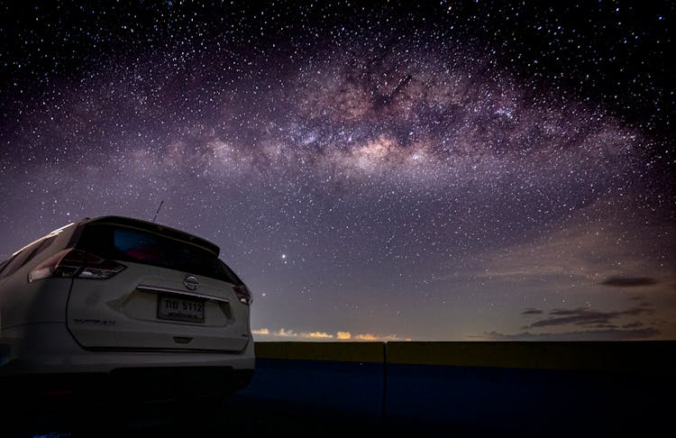 White Car On Road During Night Time