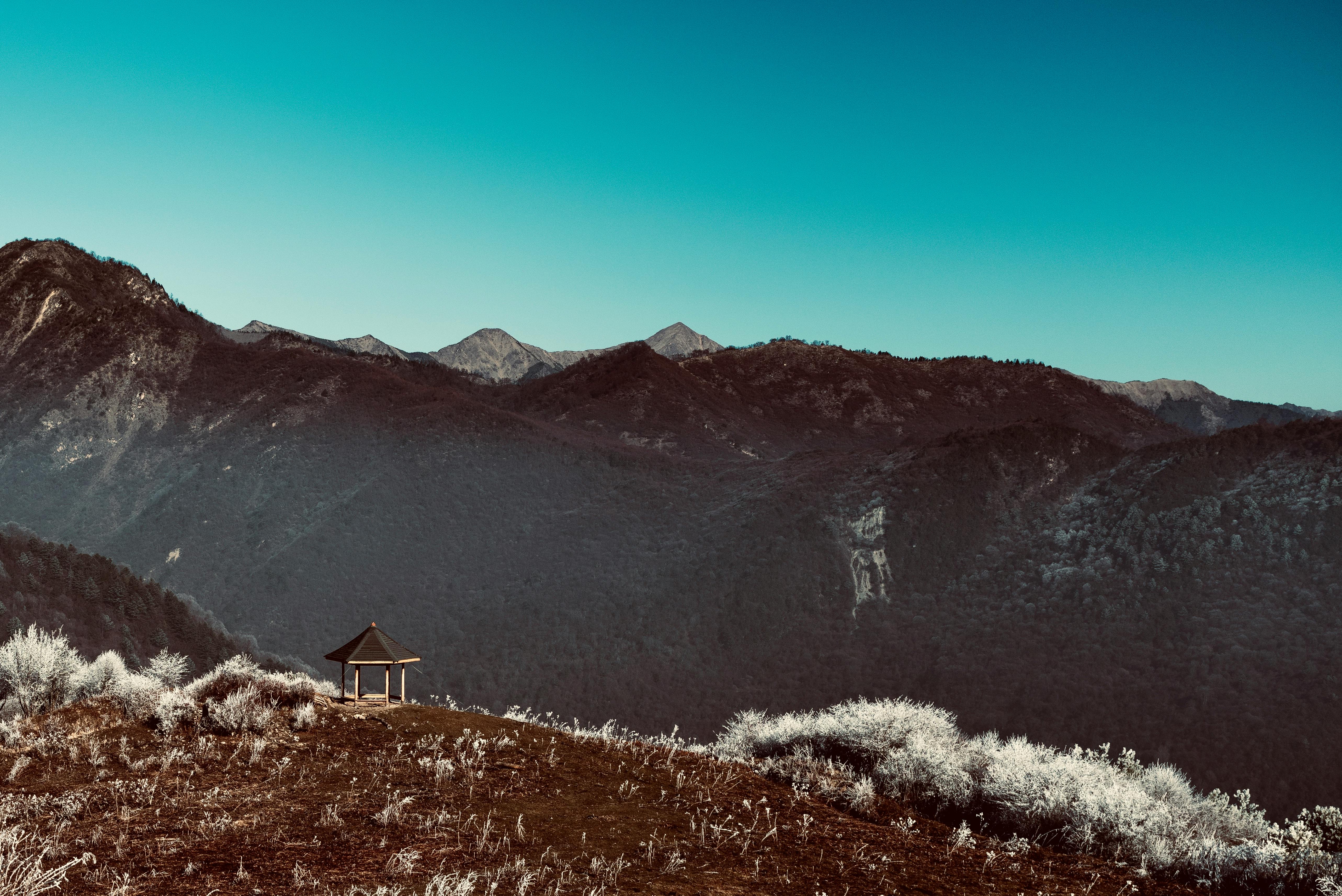 Gazebo Near Mountain Under Blue Sky · Free Stock Photo