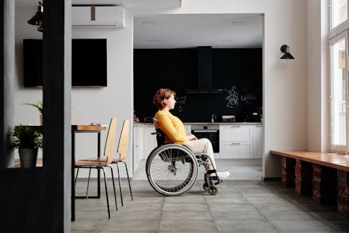 Woman Sitting in Wheelchair