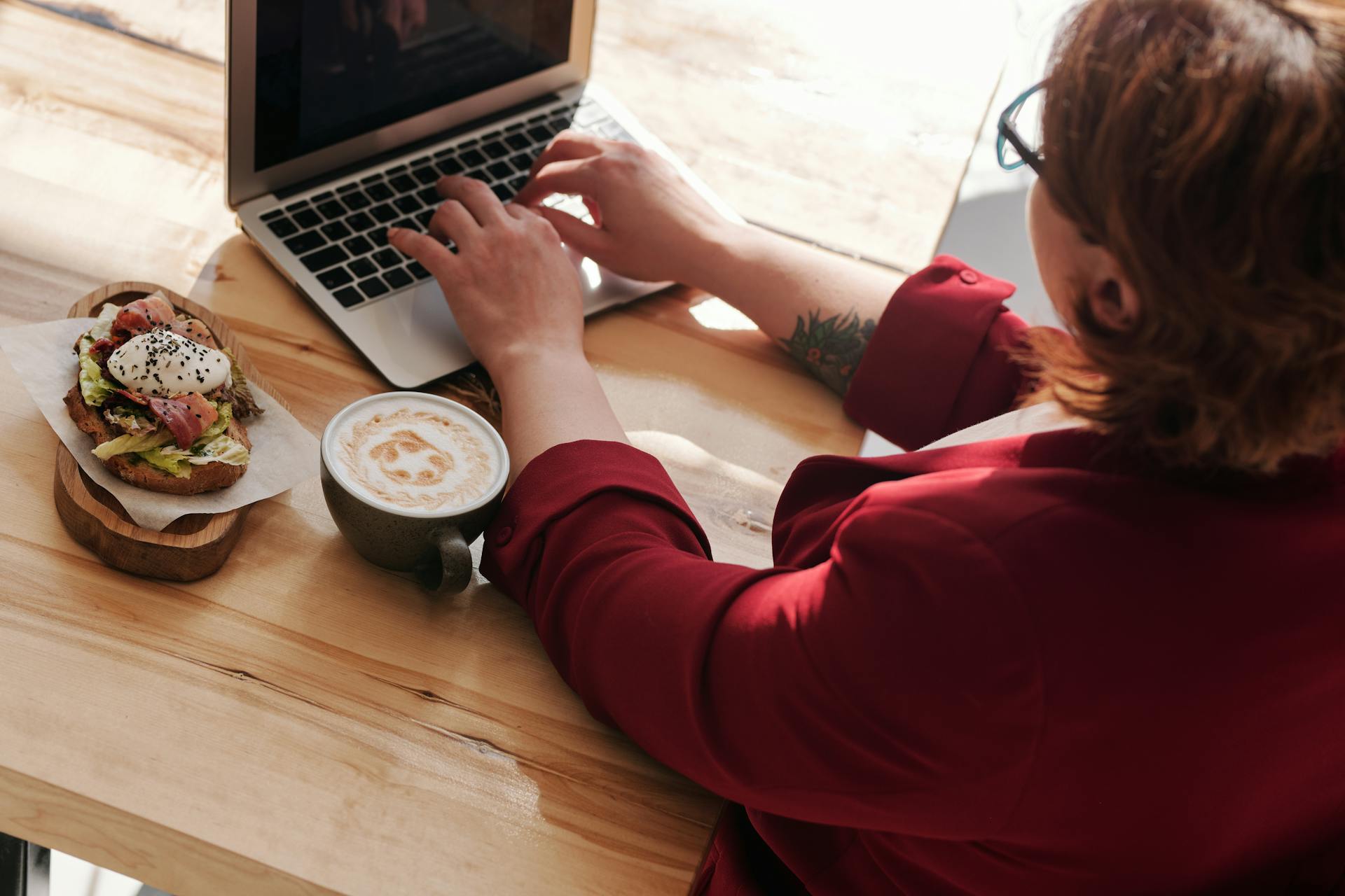 Woman Using MacBook Pro