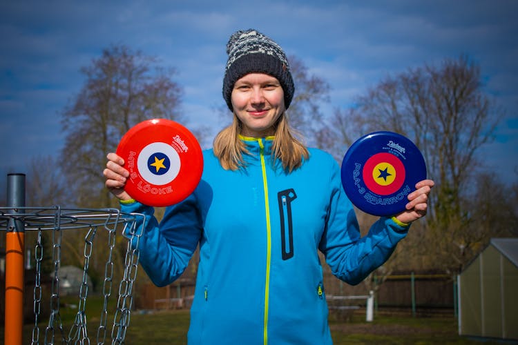 Woman Holding Discs