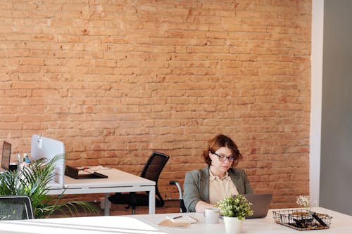 Woman Using Laptop