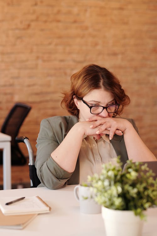 Free Photo of Woman Looking Pensive Stock Photo