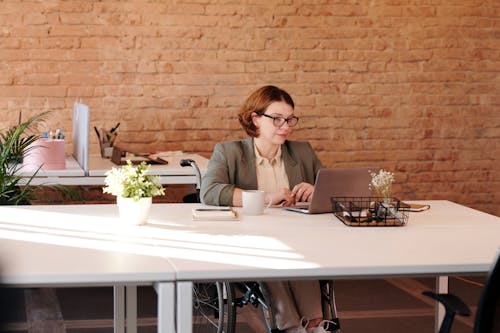 Woman Using Laptop