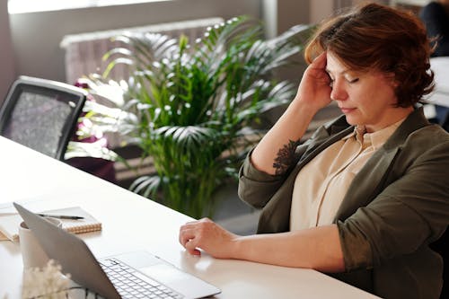 Free Photo of Woman Holding Her Head Stock Photo