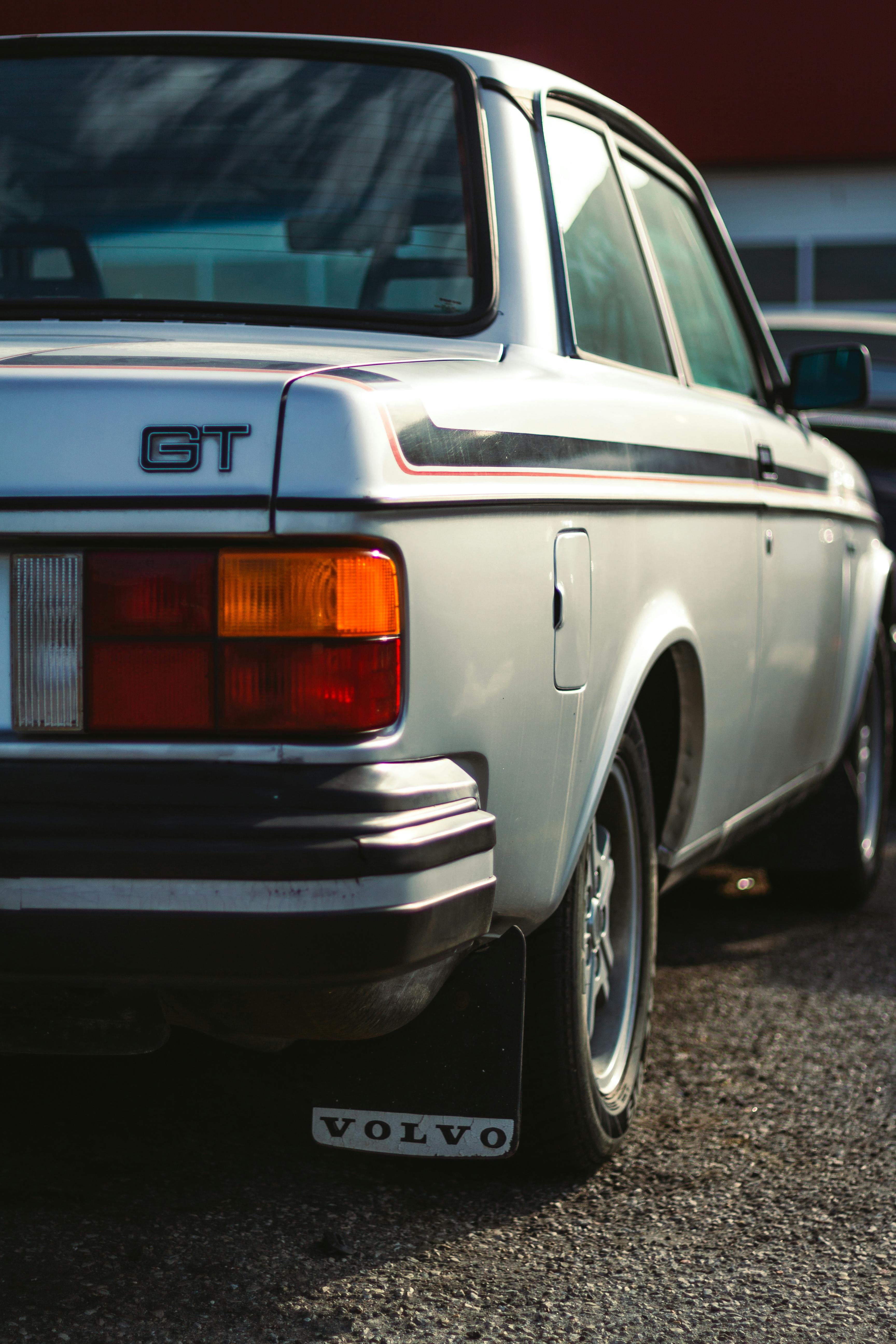 Person looking at their reflection while holding a smartphone