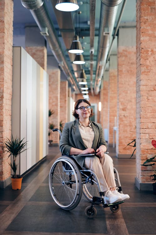 Free Woman Sitting on Wheelchair Stock Photo