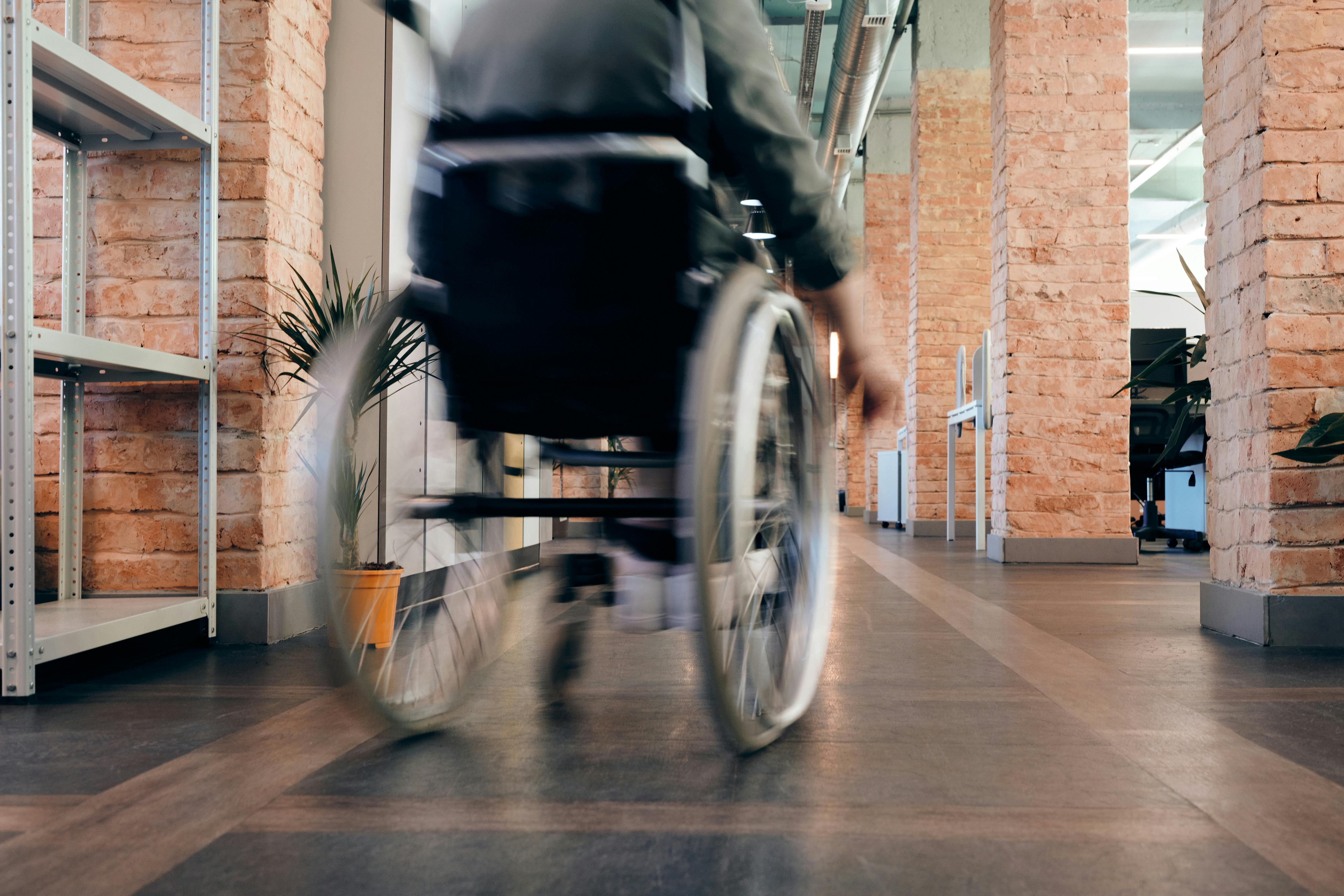 Photo Of Person Using Wheelchair Free Stock Photo   Pexels Photo 4064339 