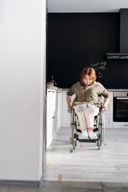 Woman Sitting on Wheelchair