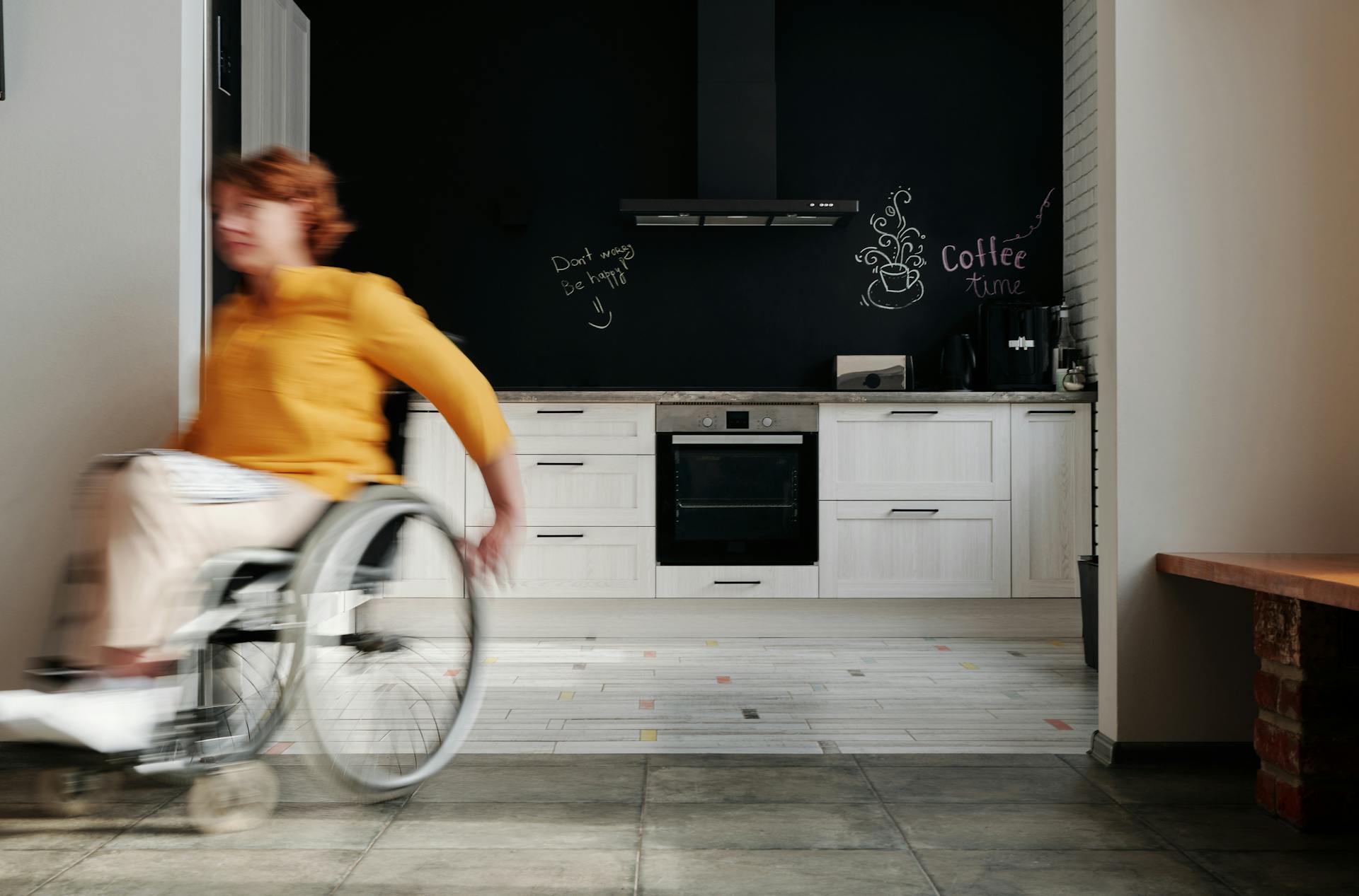 Woman Moving Using a Wheelchair