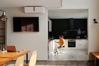 Woman in Wheelchair in Kitchen