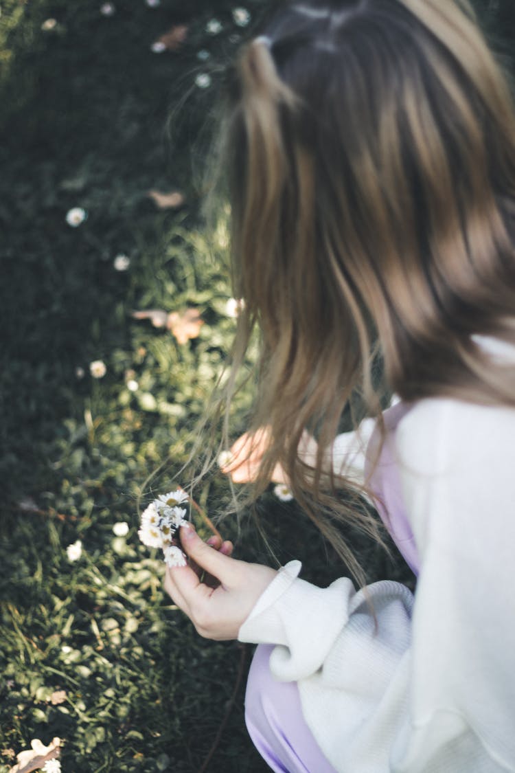 A Woman Picking Flowers