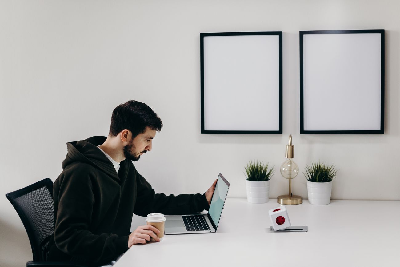 Working at a desk in a bright Nordic office