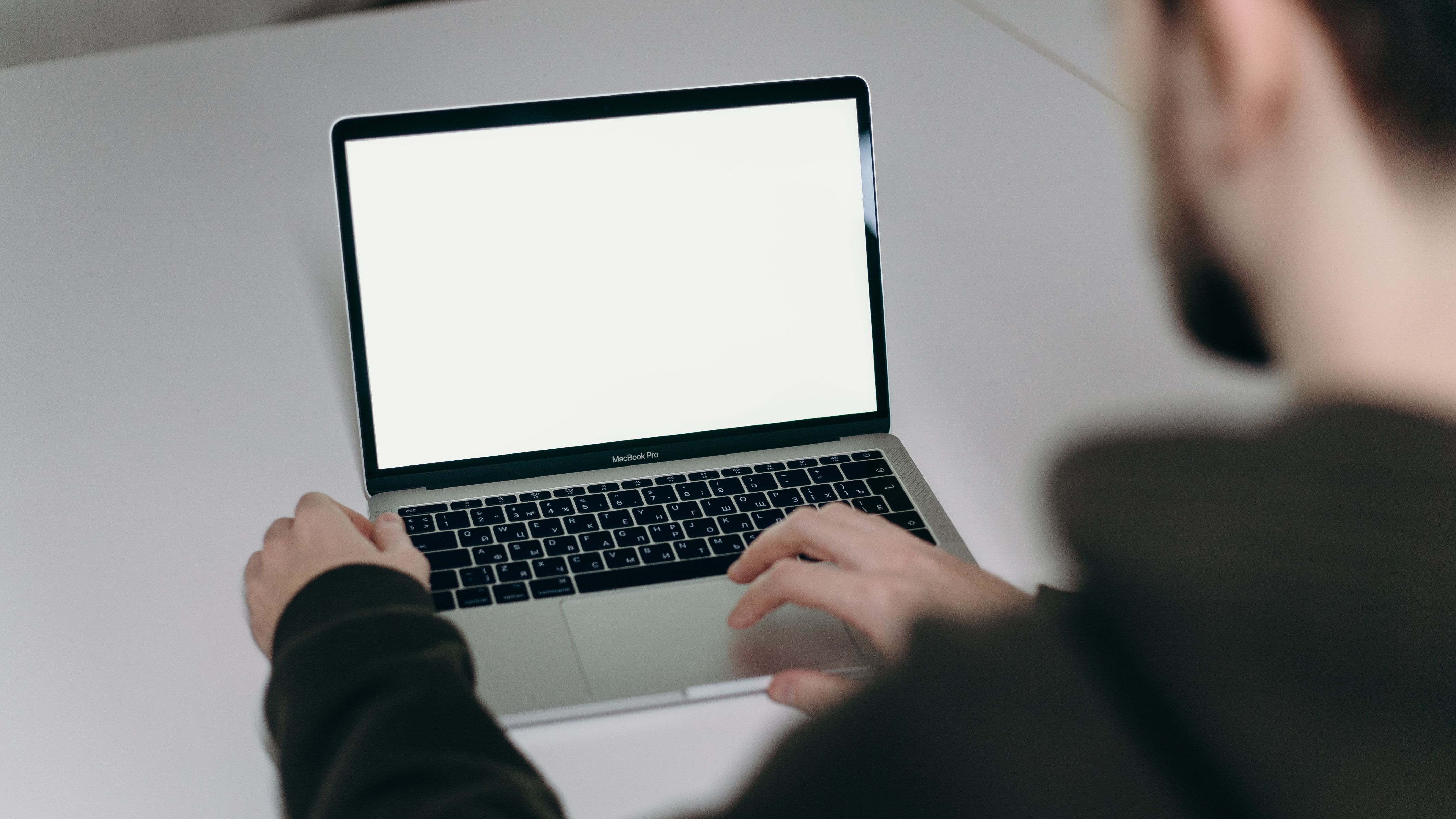 Man using his Macbook