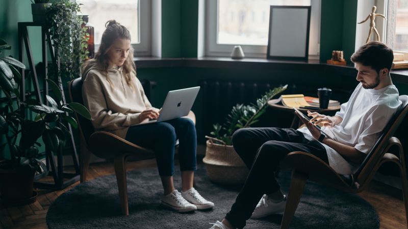 couple looking at laptop computer