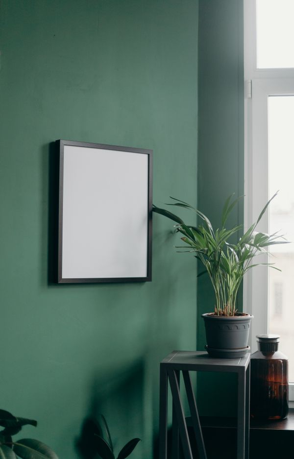 Blank frame on a painted wall by cottonbro studio on Pexels