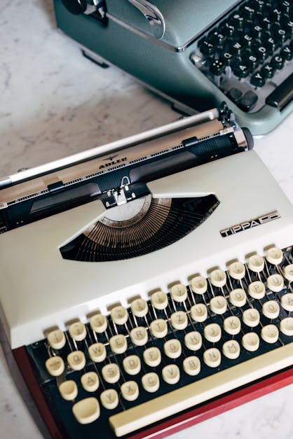 green typewriters on kitchen table