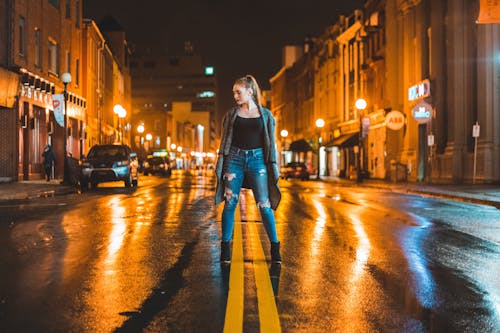 Woman Wearing Black Bra and Distressed Jeans · Free Stock Photo