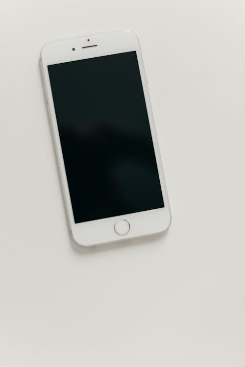 Free Silver Iphone 6 on White Table Stock Photo
