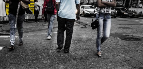 Free Busy city street scene featuring pedestrians walking on asphalt in daylight. Stock Photo