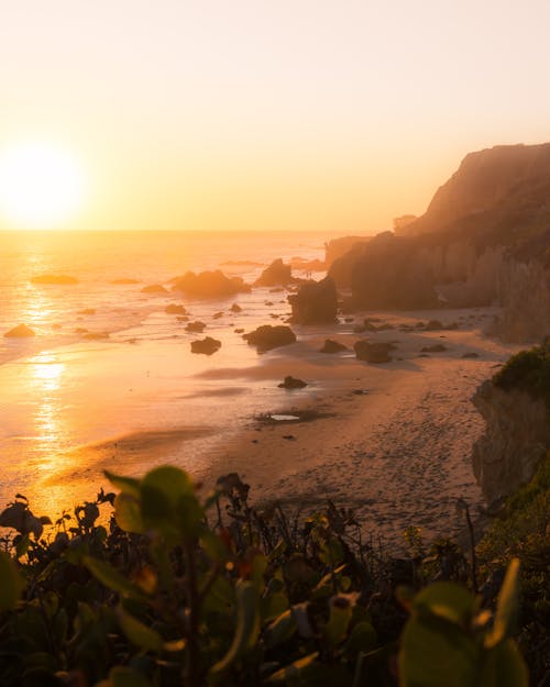 Photo Of Beach During Dawn 