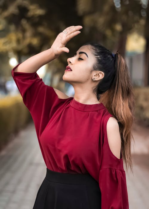 Photo Of Woman Wearing Red Top