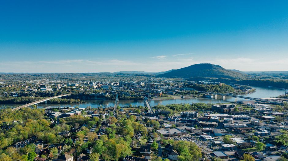 Aerial view of Chattanooga, TN showing the Tennessee River and surrounding landscape