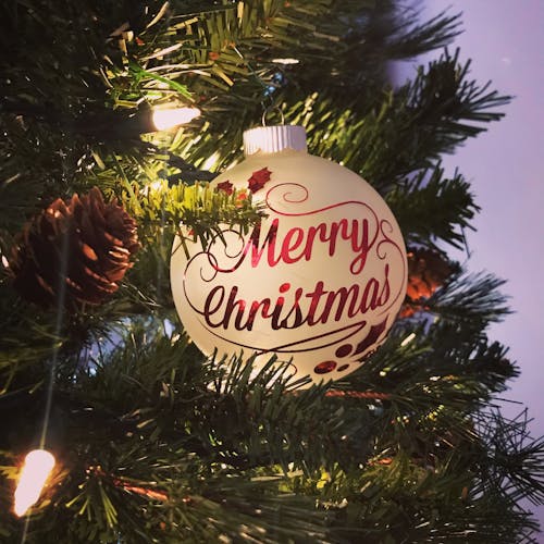 Photo of Christmas Bauble With Merry Christmas Greeting