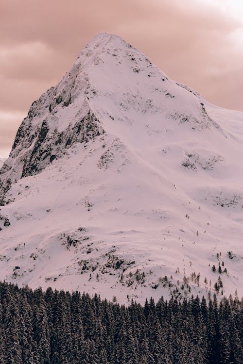 Photo Of Snow Covered Mountain During Dawn 