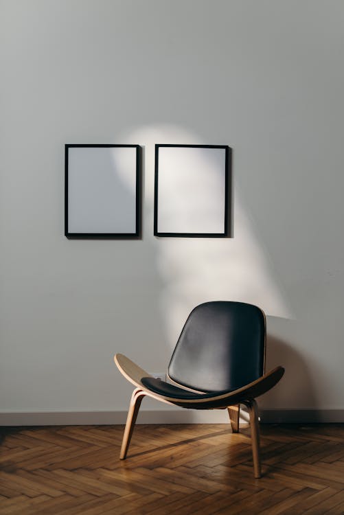 Free Black Wooden Framed Black Padded Armchair Stock Photo