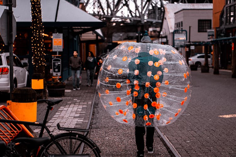 Person Wearing Plastic Balloon 