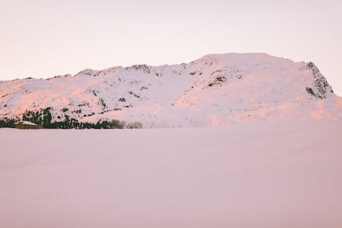 Free Photo Of Snow Covered Mountain During Dawn  Stock Photo