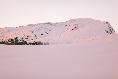 Free Photo Of Snow Covered Mountain During Dawn Stock Photo
