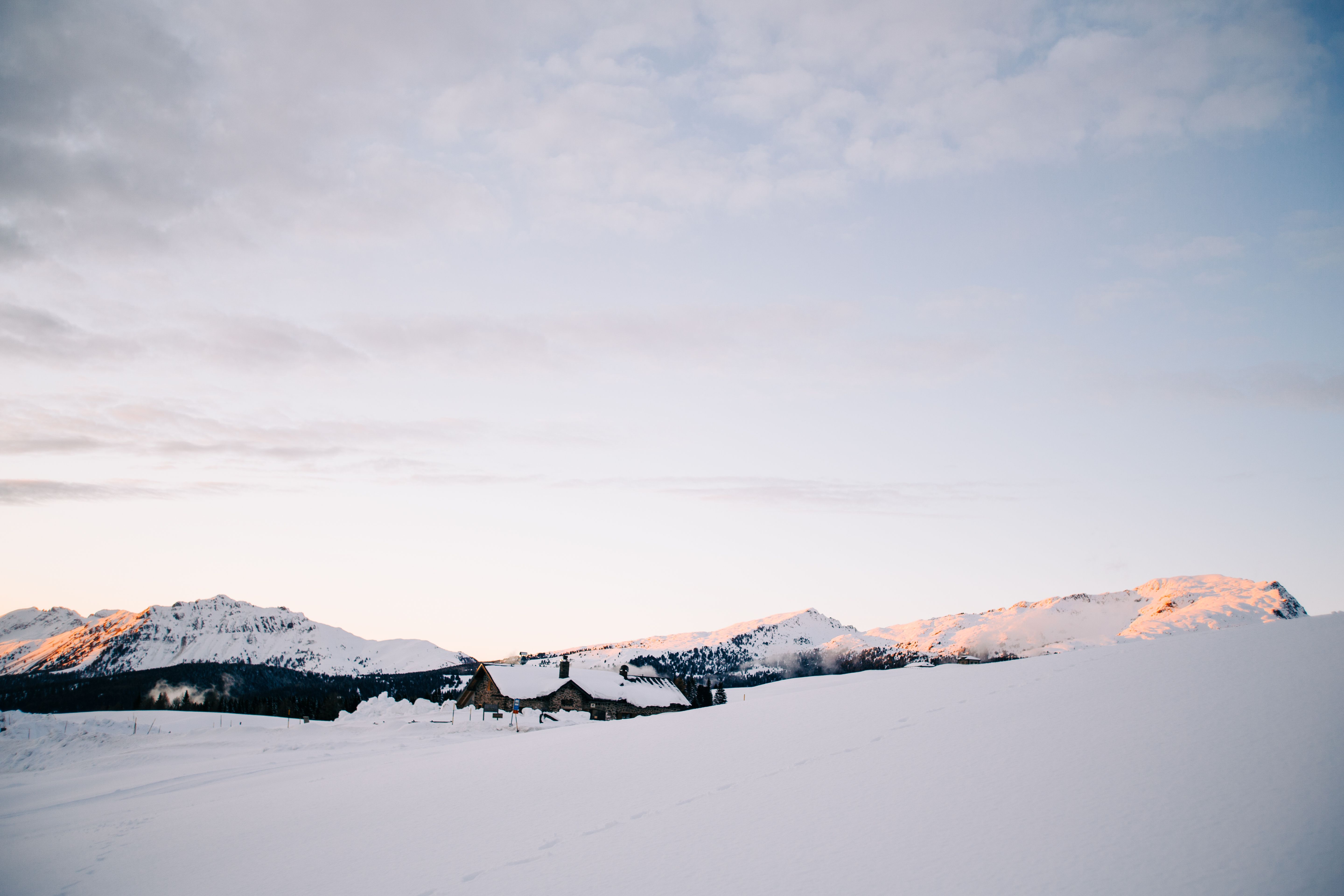 Photo Of Snow Covered Mountain Under Cloudy Sky · Free Stock Photo