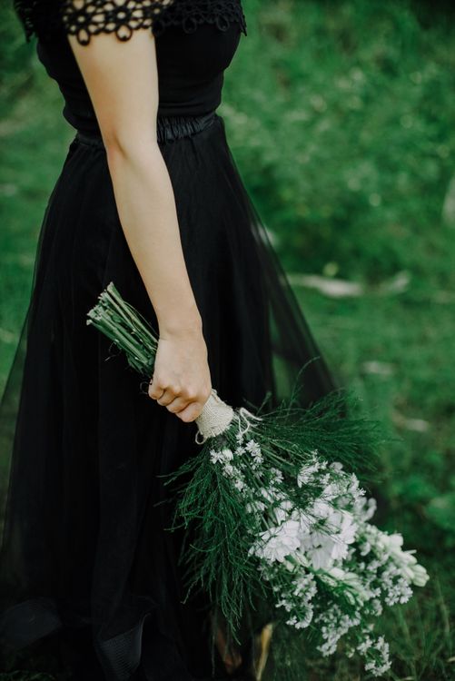 Woman in Black Dress Holding White Flowers Free Stock Photo Woman in Black Dress Holding White Flowers Free Stock Photo