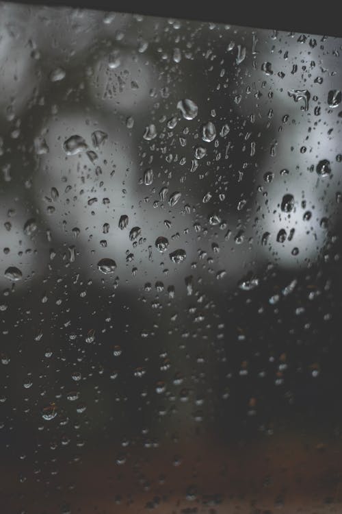 Free Photo Of Water Droplets On Glass Panel Stock Photo