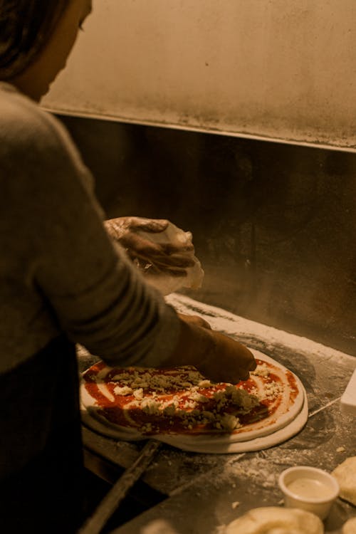 Free Woman Making Pizza Stock Photo