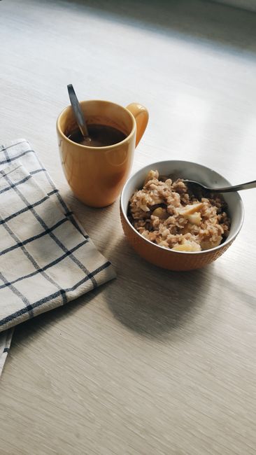 warm porridge bowl with spoon