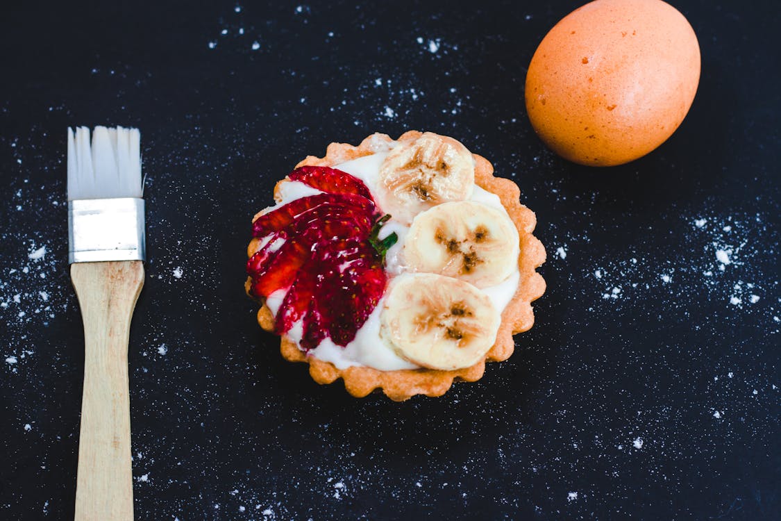 Free  Fruit Tart on Black Table Stock Photo